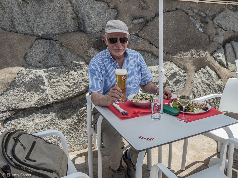 AlanC enjoying a beer by the beach