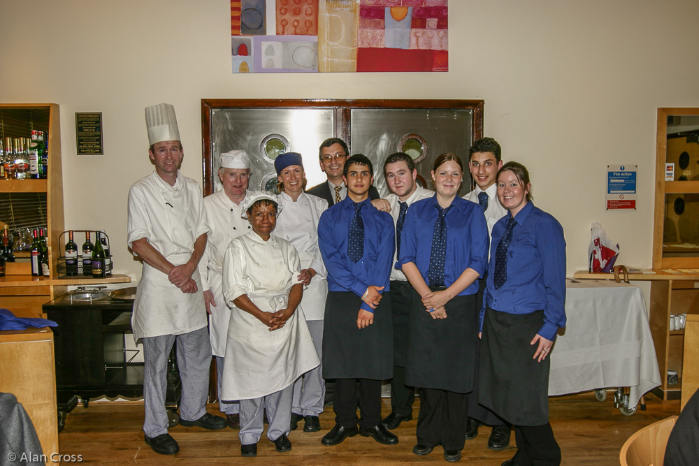 Stephen Parker (centre, back row), Lecturer in Hospitality at Richmond College, with the team that looked after us on the night