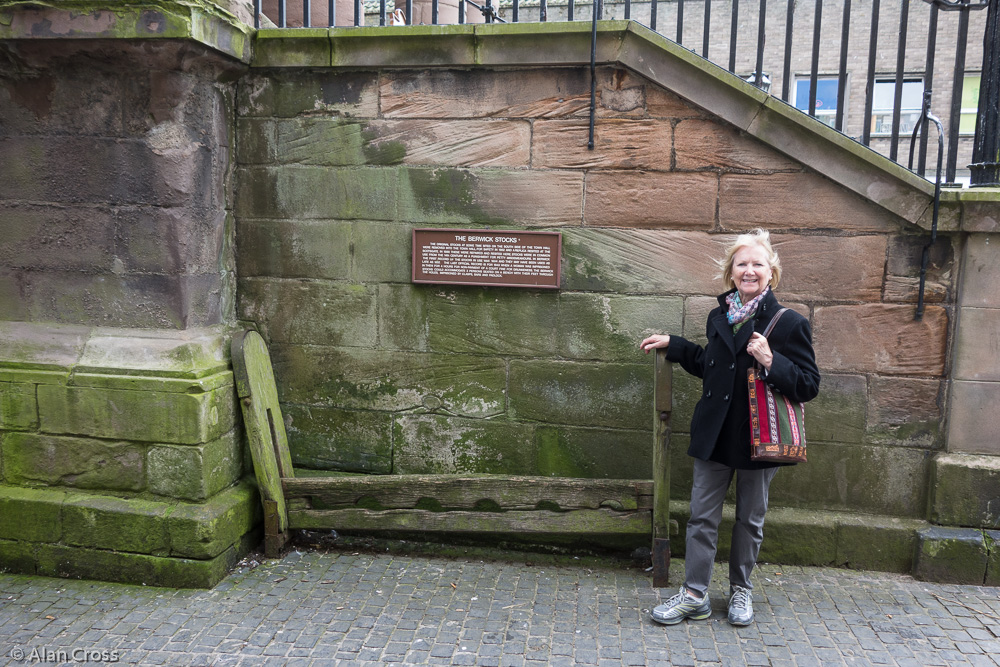 Eileen and stocks by the Town Hall (once painted by LS Lowry)