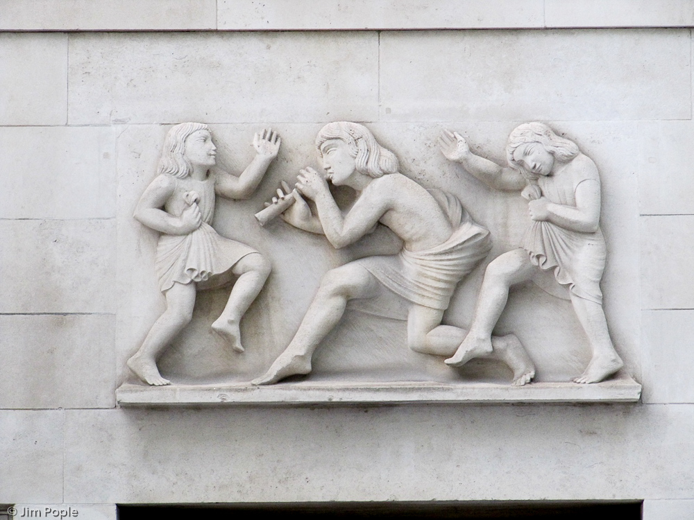 Another Eric Gill scupture: Ariel represented piping to children