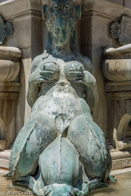 Bologna. Figure at the foot of Neptune in Piazza Maggiore