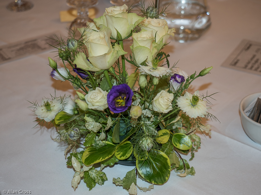 Beautiful flower decorations on each table were kindly provided by Inès White