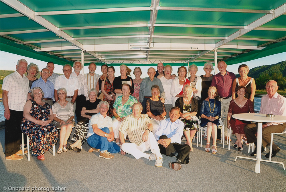 Gathered for a group photo on the sun deck of MS Camargue on the last evening