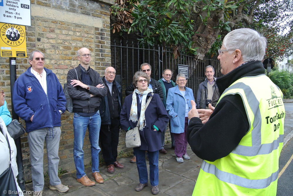 Tour Guide Dave explains the inportance of location by the river Thames