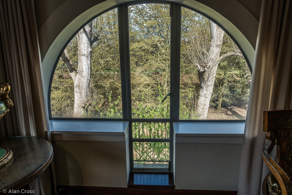 One of many arch-topped windows, a feature throughout the house