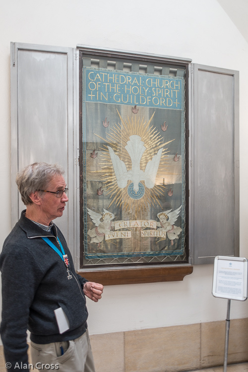 John showing us the Cathedral Banner, designed by the architect Sir Edward Maufe