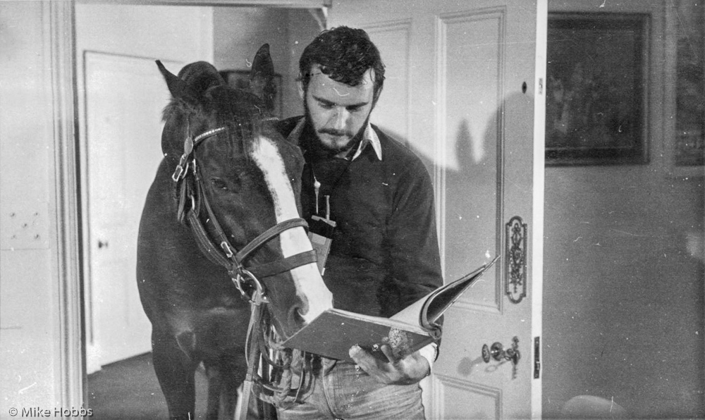 Peter Groome and horse reading script