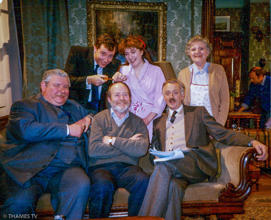 Group shot from back left, actors Robin Kermode, Felicity Montagu, ? played housekeeper?; front left Richard Griffiths, Derrick Goodwin, Benjamin Whitrow.