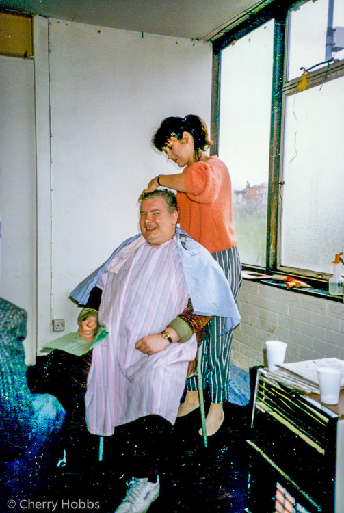 Rehearsal room - Richard Griffiths having hair cut by Eva Marieges