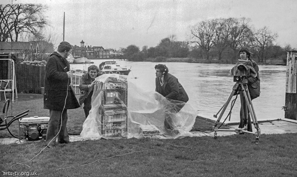 Equipment on riverbank. From left John Ridge, Ray Nicholson, Wally Williams, Tom Rogers (engineer)