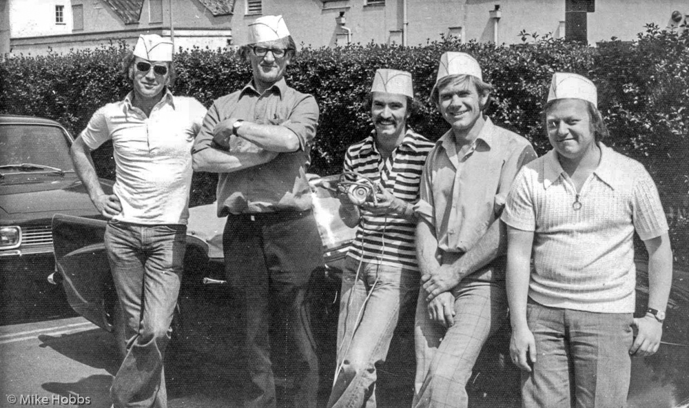OB crew wearing funny hats – Phil Haines, Peter Bond, Mike Hand Bowman, Ray Nicholson, Chris Munt leaning against Phil’s Daimler Dart car