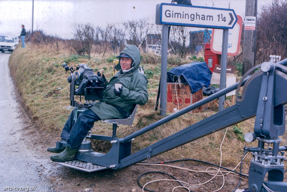 Mike Hobbs sits on camera on crane near Gimingham